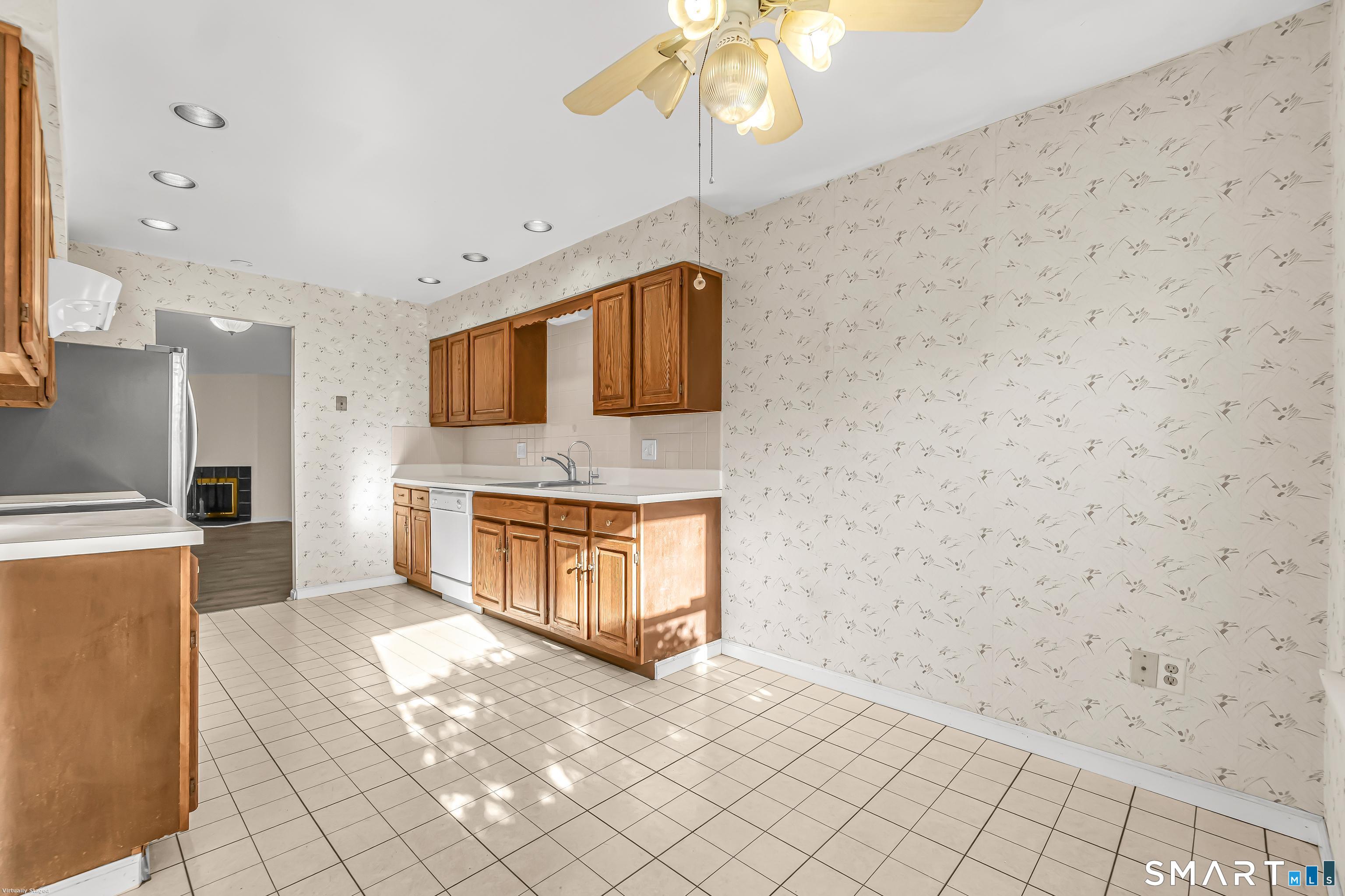4023 Park Avenue, Unit 4023 Fairfield, CT 06825 - Photo 15 of 25 a bathroom with a sink a mirror and a shower