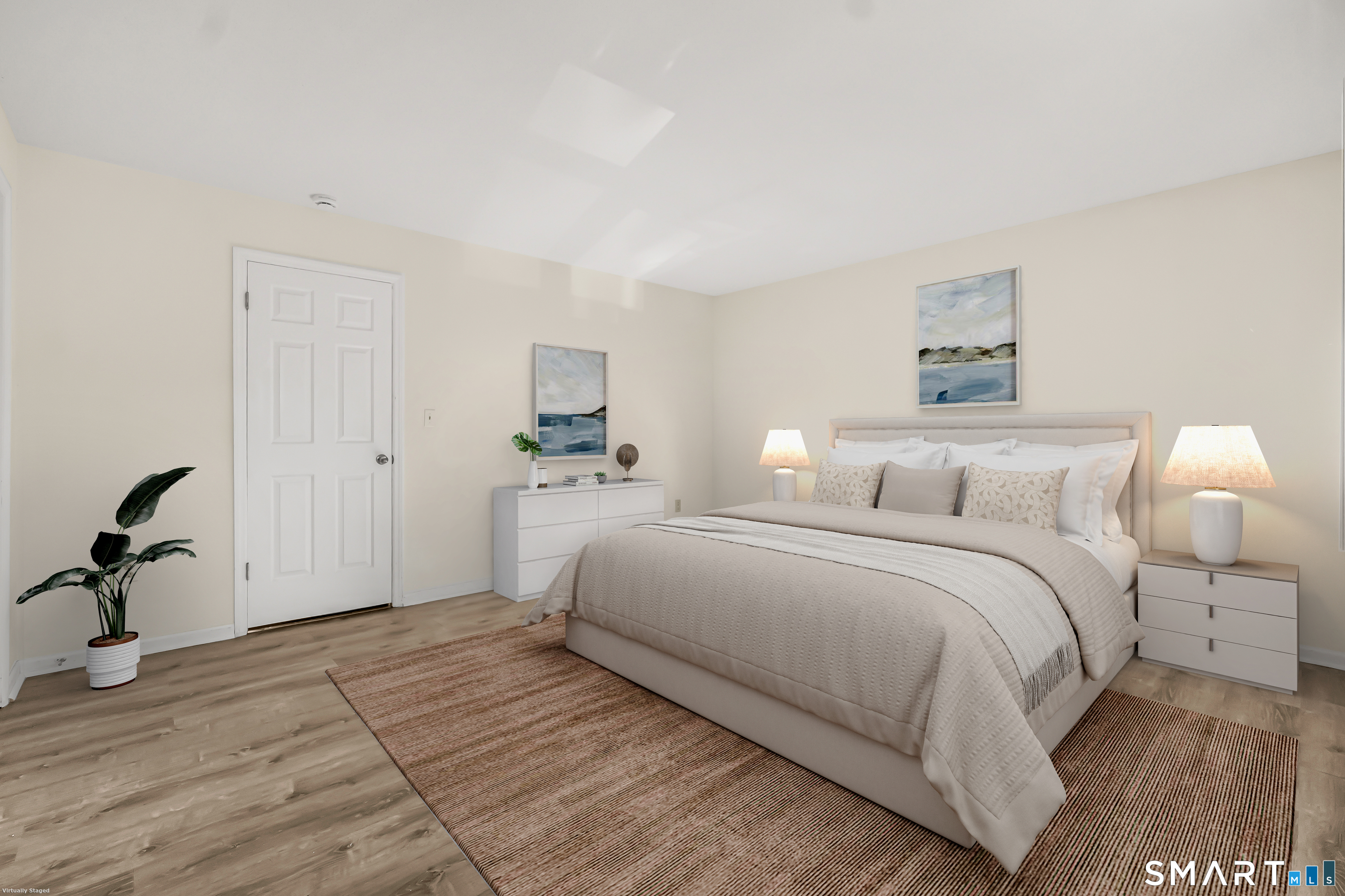 4023 Park Avenue, Unit 4023 Fairfield, CT 06825 - Photo 7 of 25 a bedroom with a bed and a table