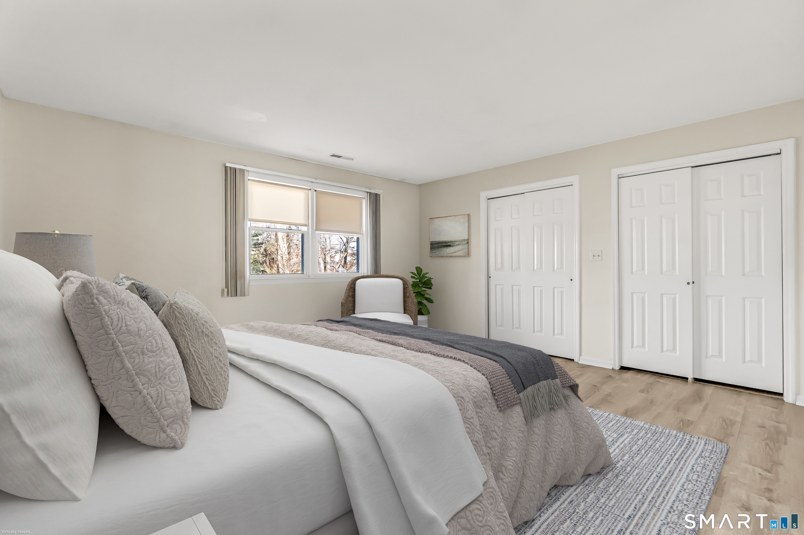 4023 Park Avenue, Unit 4023 Fairfield, CT 06825 - Photo 9 of 25 a bedroom with a bed and a window