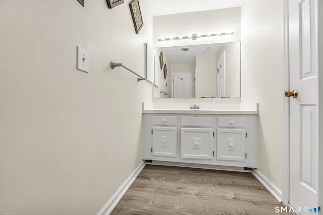 a view of a sink and a mirror