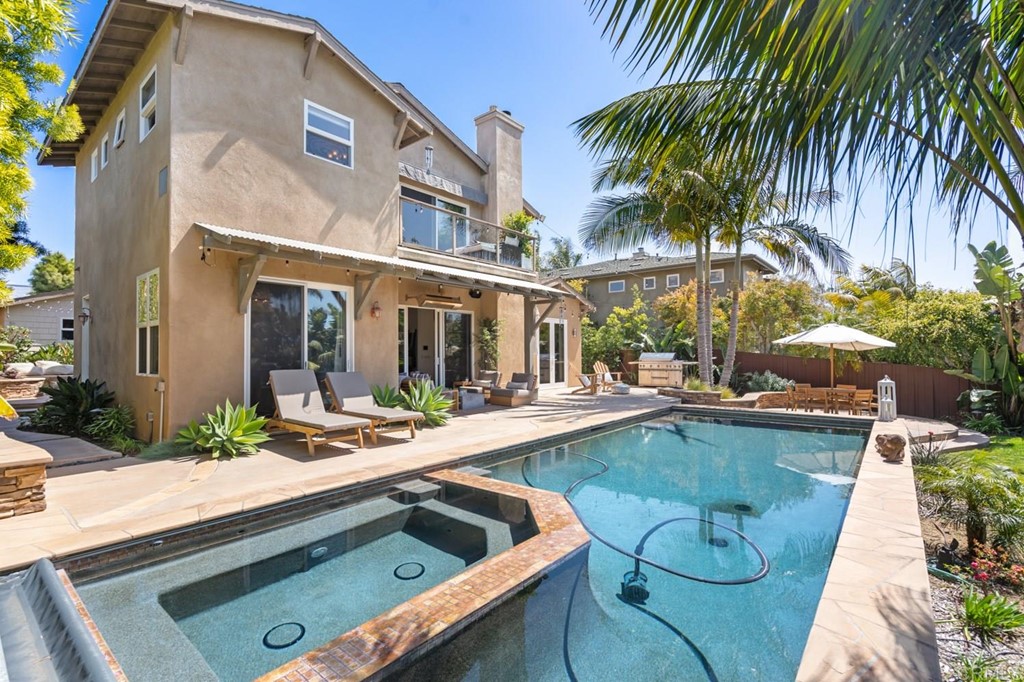 1068 Devonshire Drive Encinitas, CA 92024 - Photo 28 of 44 a view of a house with pool and sitting area