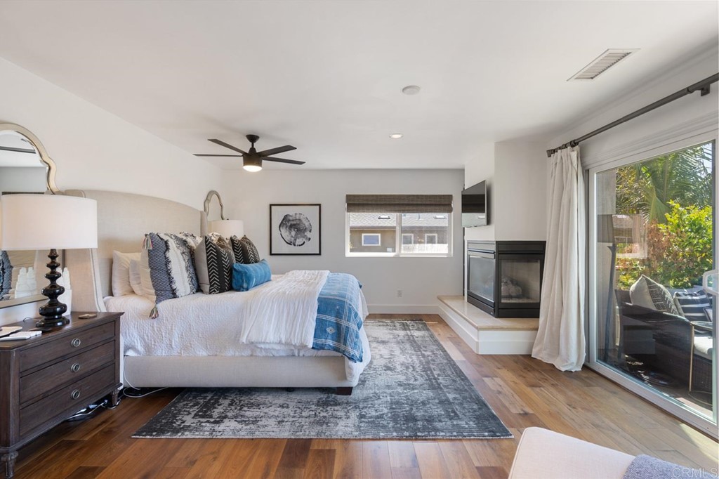 1068 Devonshire Drive Encinitas, CA 92024 - Photo 32 of 44 a living room with furniture and a fireplace