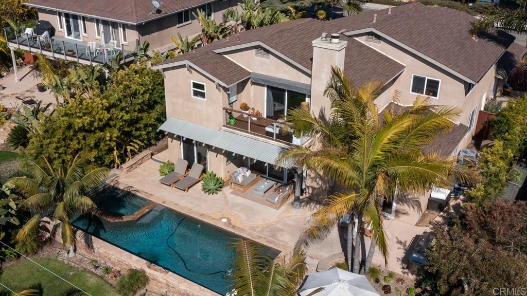 1068 Devonshire Drive Encinitas, CA 92024 - Photo 41 of 44 a view of a house with a patio