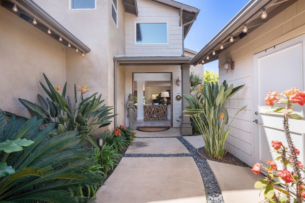 1068 Devonshire Drive Encinitas, CA 92024 - Photo 5 of 44 a potted plant in front of a house