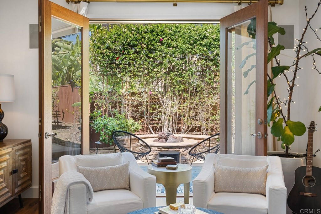 1068 Devonshire Drive Encinitas, CA 92024 - Photo 10 of 44 a living room with furniture and a window