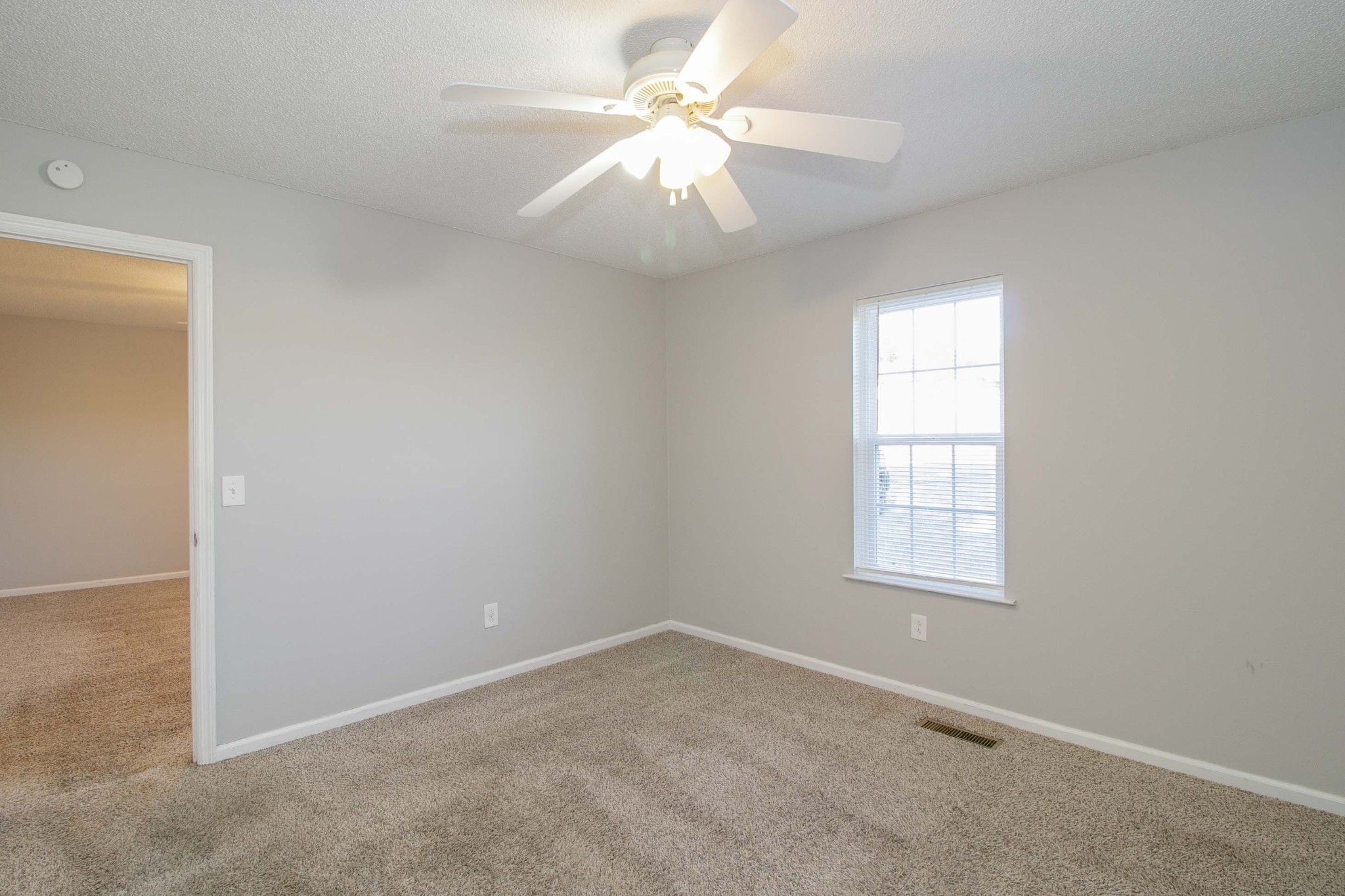 1100 Mcdaniel Road Clarksville, TN 37043 - Photo 59 of 71 an empty room with windows and fan
