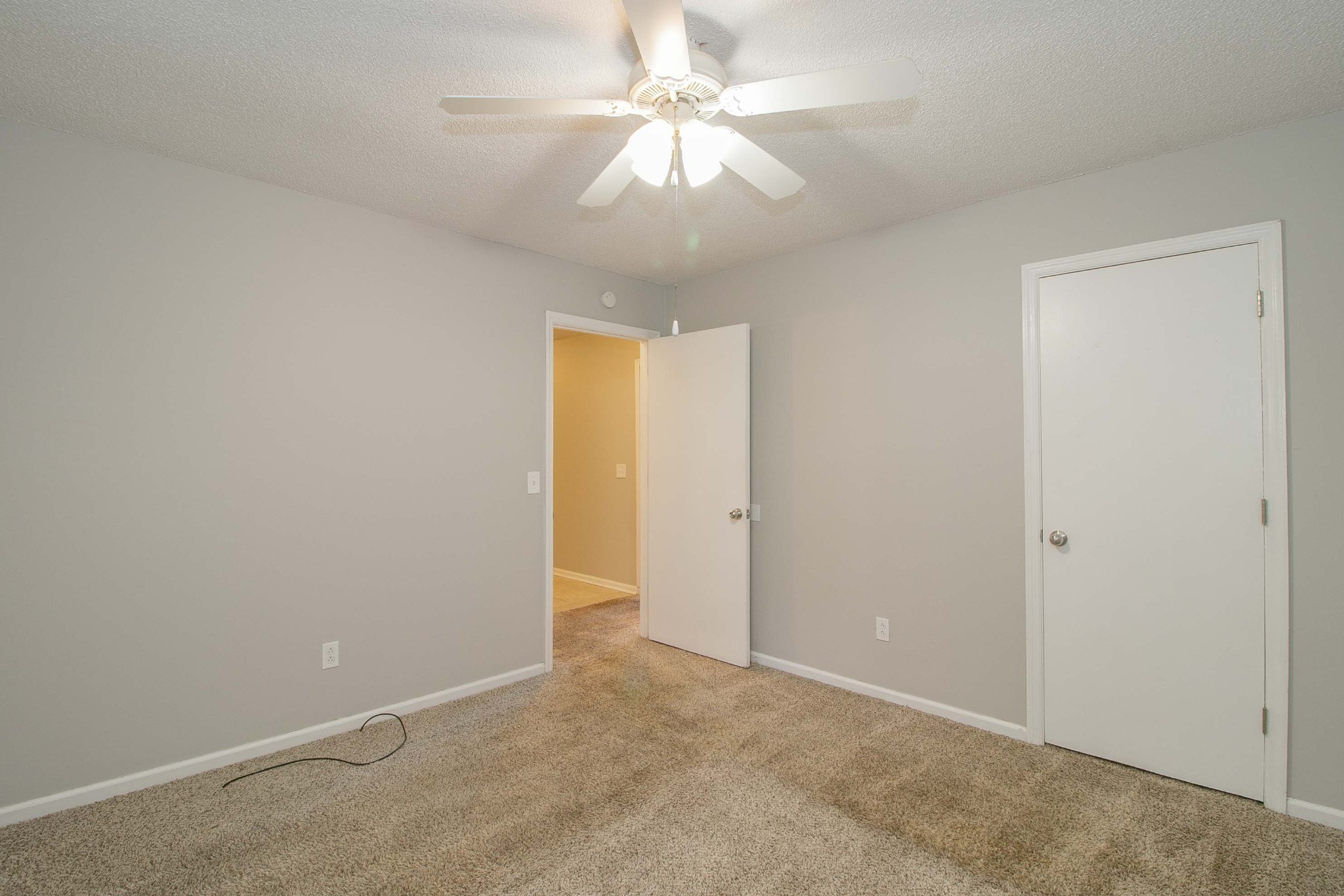 1100 Mcdaniel Road Clarksville, TN 37043 - Photo 64 of 71 an empty room with a ceiling fan and a window