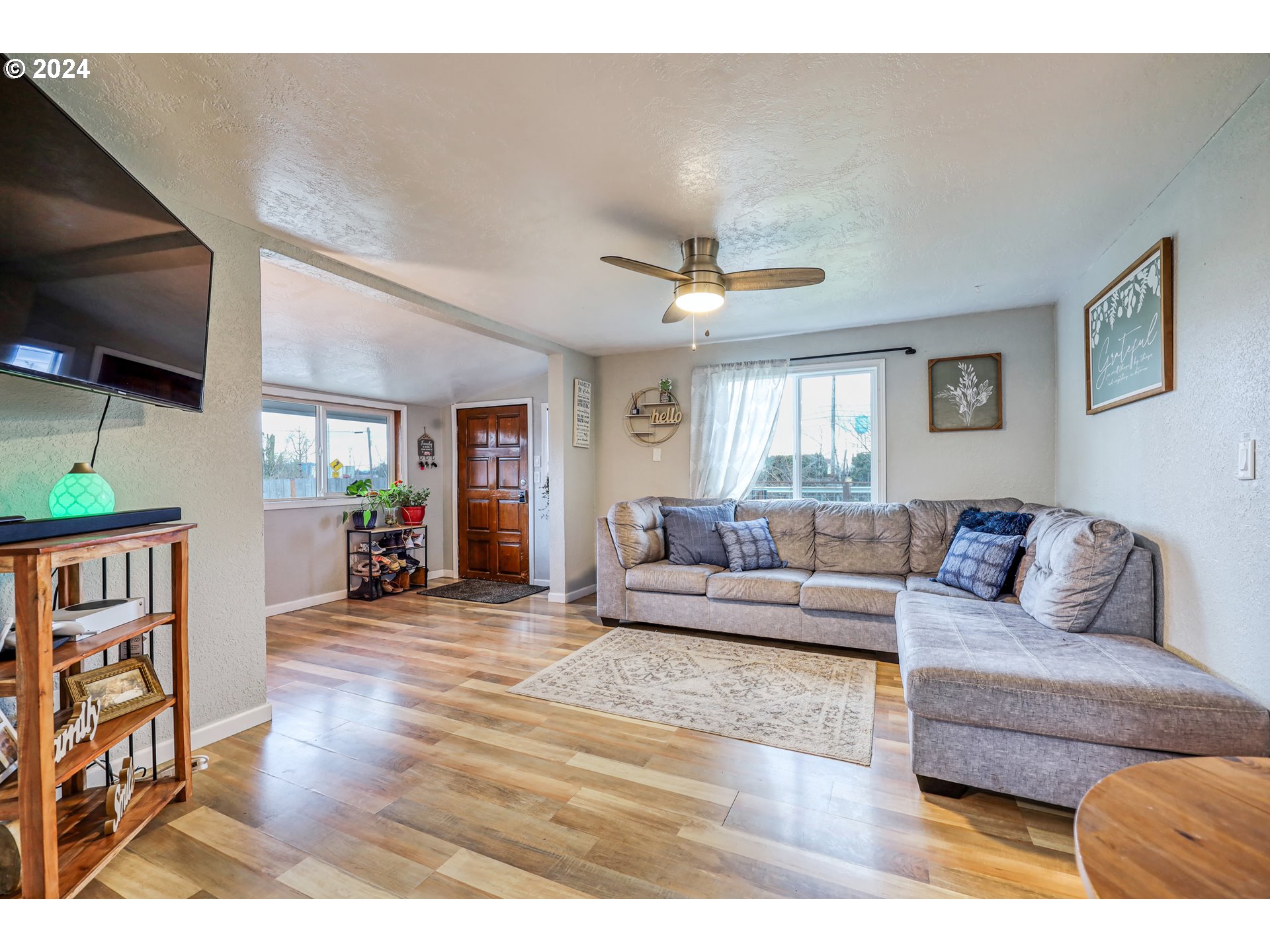 615 48th Street Springfield, OR 97478 - Photo 5 of 16 a living room with furniture and a wooden floor