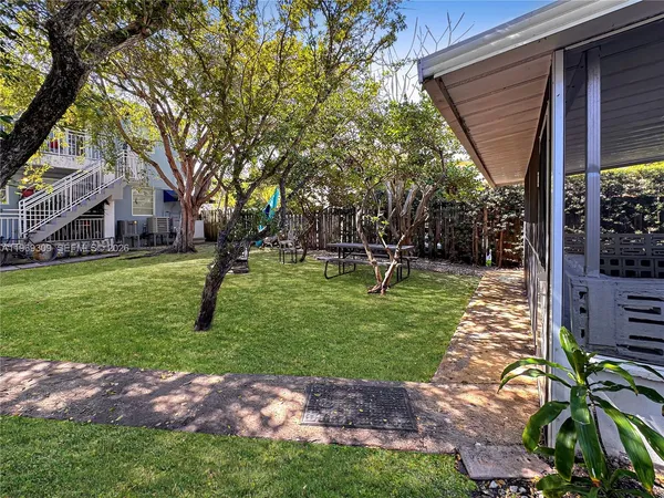 a view of a backyard with a garden