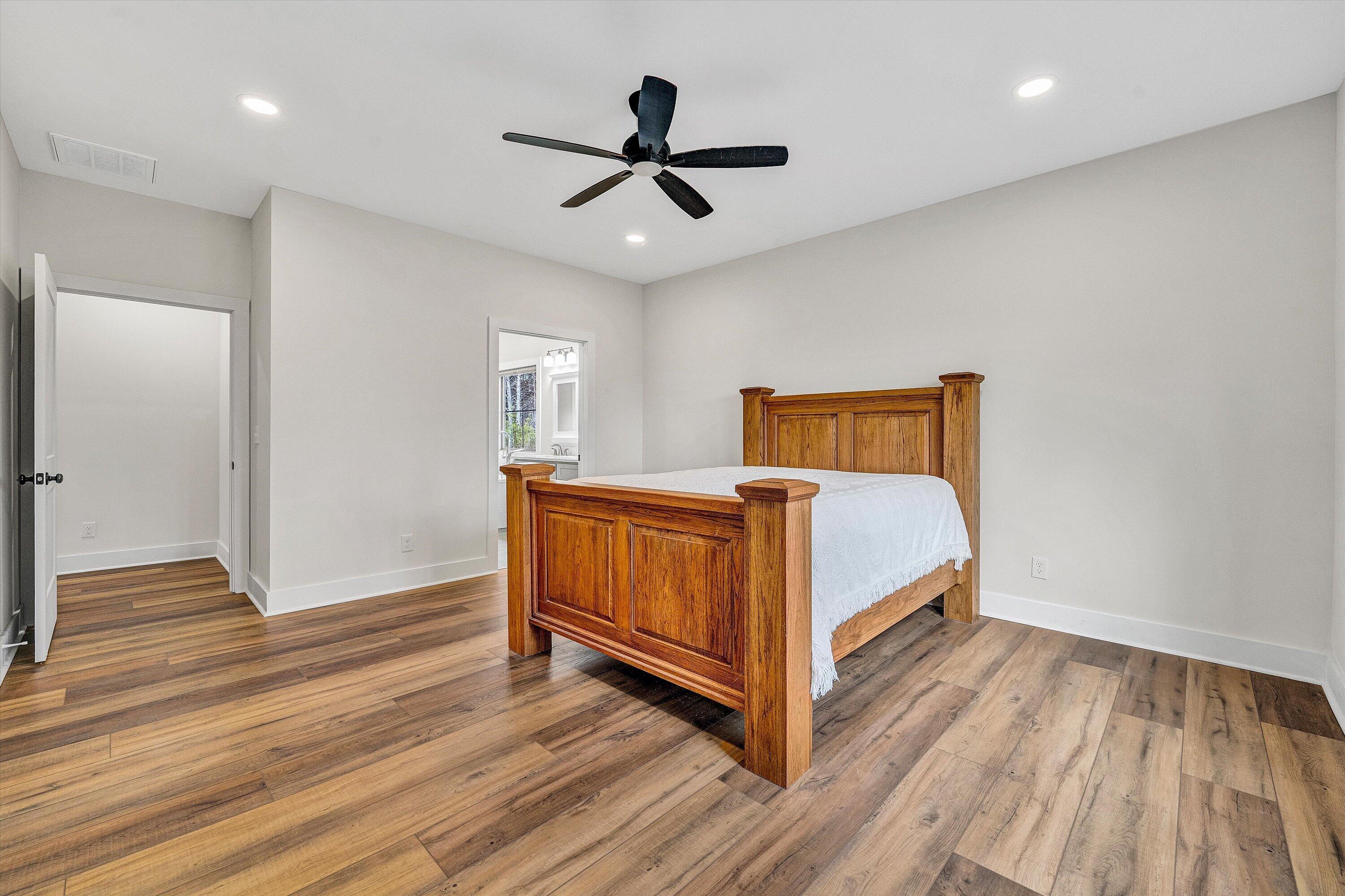 17 Alpine Drive Union Hall, VA 24176 - Photo 24 of 39 a bedroom with a bed and wooden floor
