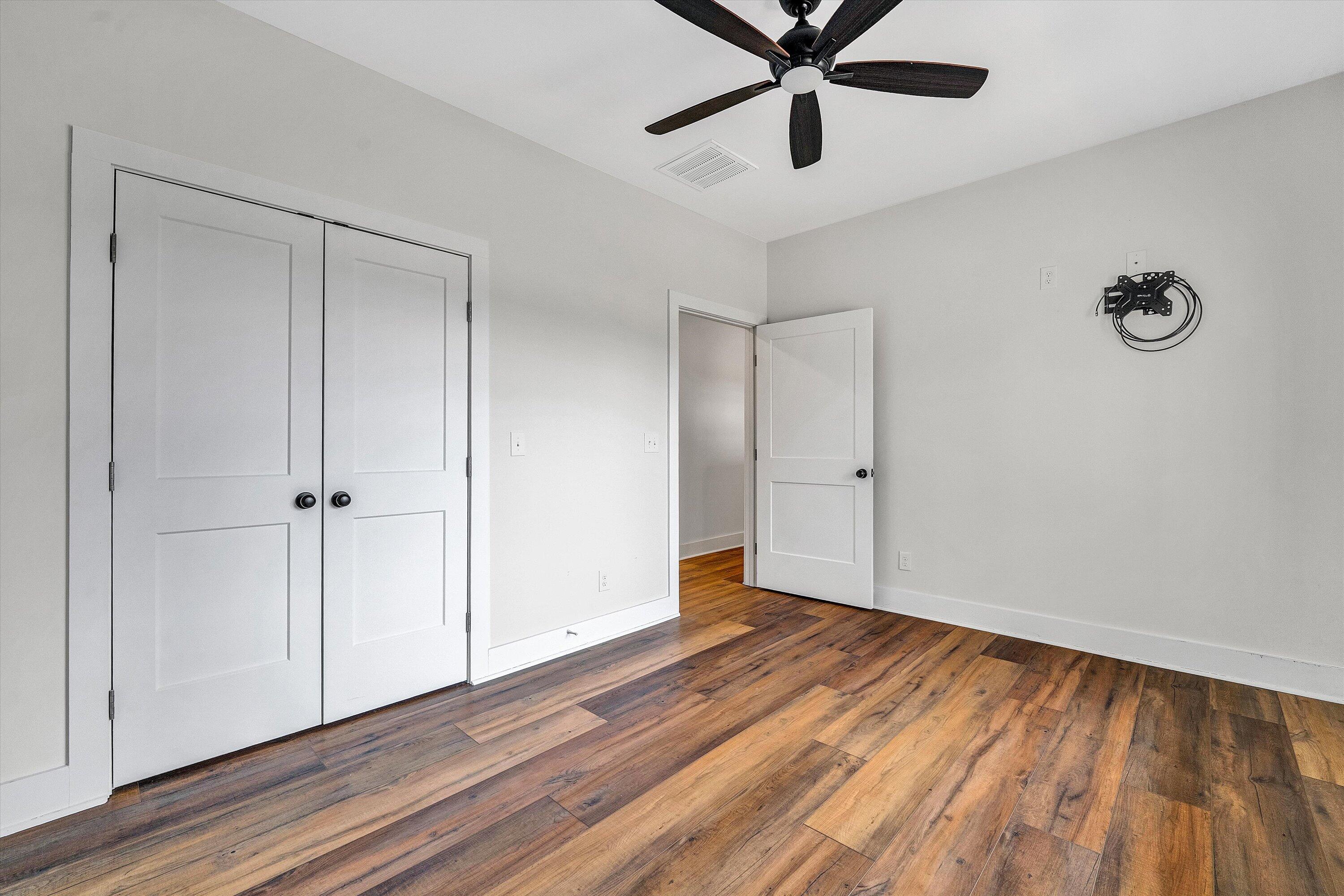 17 Alpine Drive Union Hall, VA 24176 - Photo 31 of 39 a view of empty room with wooden floor and ceiling fan