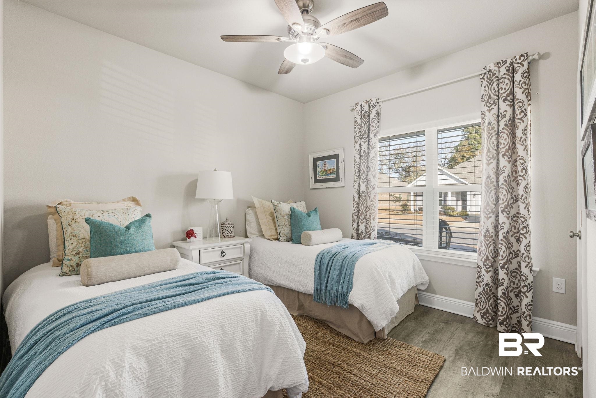 9056 Impala Drive Foley, AL 36535 - Photo 14 of 22 Bedroom with ceiling fan and wood-type flooring
