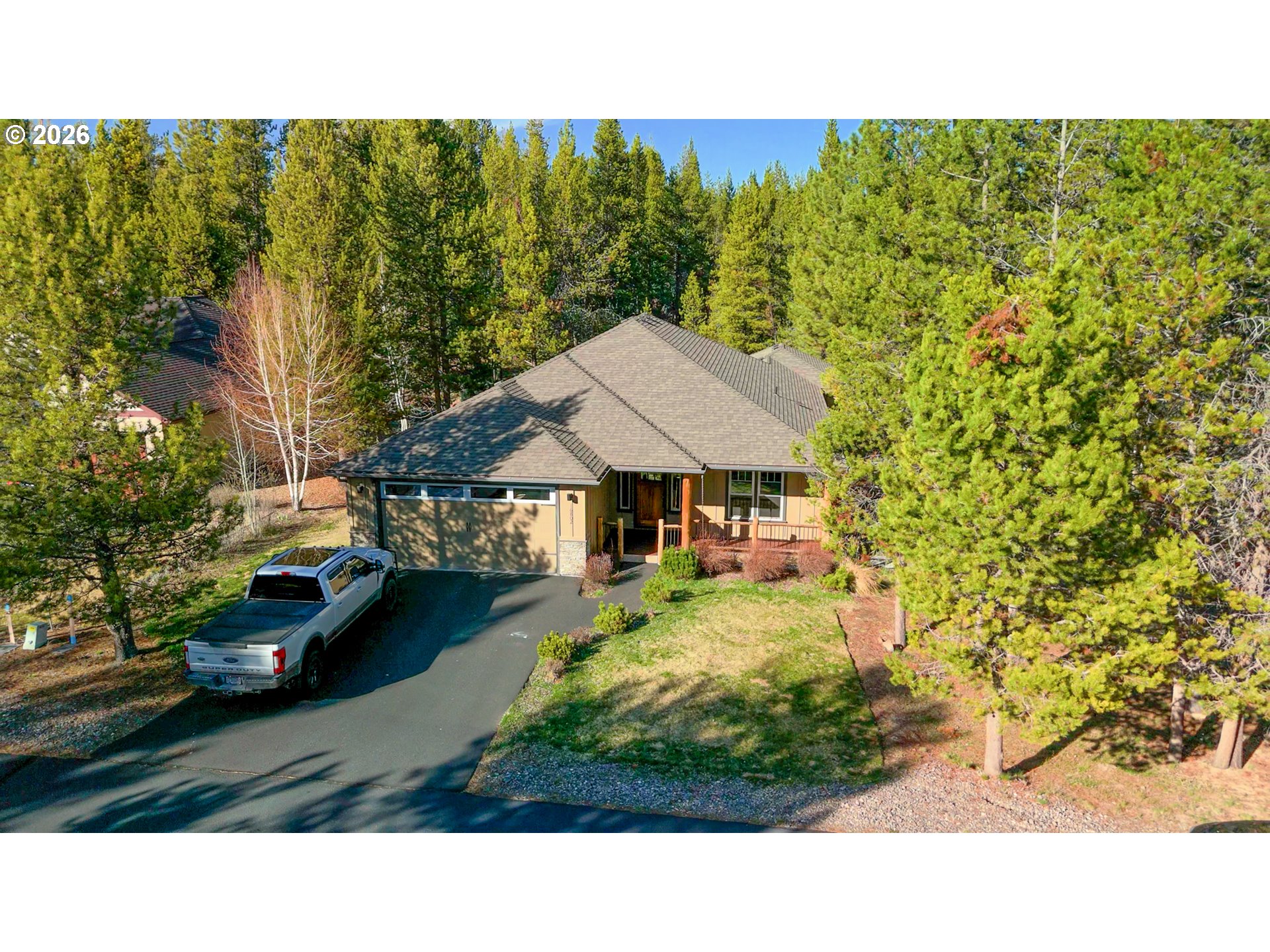 16802 Pony Express Way Bend, OR 97707 - Photo 3 of 37 a balcony with table and chairs