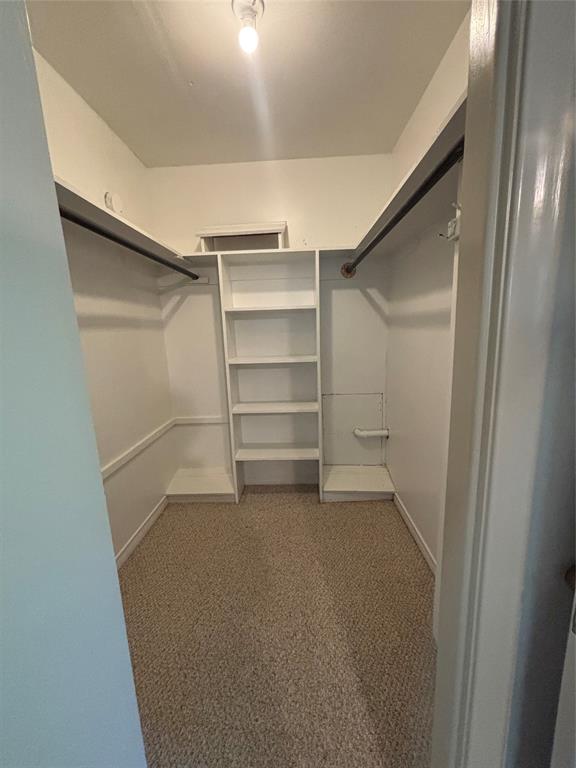 1910 Jefferson Street Commerce, TX 75428 - Photo 3 of 16 a view of an empty walk in closet