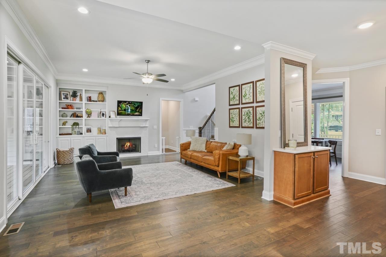 8600 Flannery Court Knightdale, NC 27545 - Photo 11 of 36 a living room with furniture and a fireplace