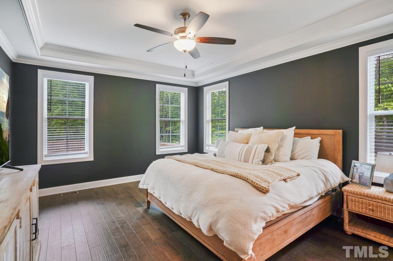8600 Flannery Court Knightdale, NC 27545 - Photo 15 of 36 a bedroom with bed and window