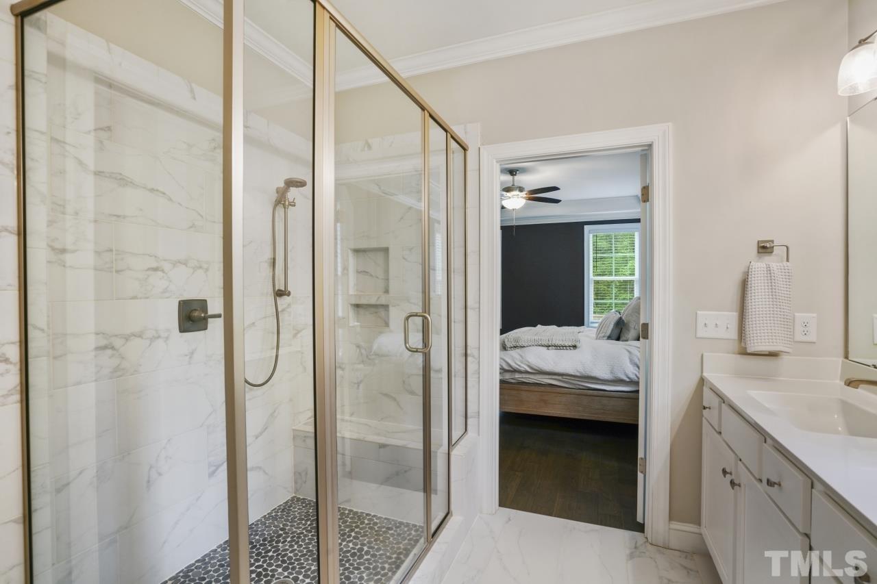 8600 Flannery Court Knightdale, NC 27545 - Photo 17 of 36 a en suite bathroom with a shower