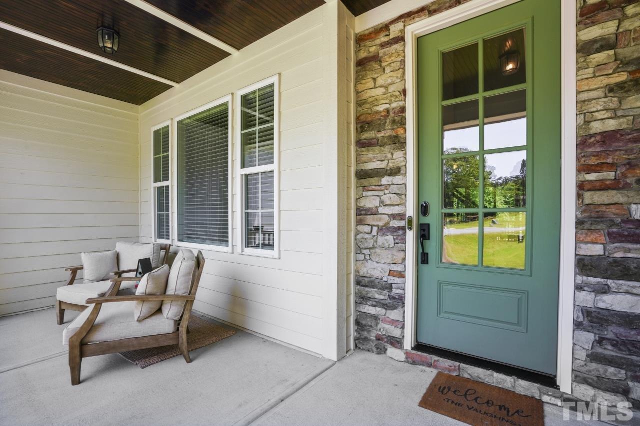 8600 Flannery Court Knightdale, NC 27545 - Photo 3 of 36 a view of two chairs in the balcony