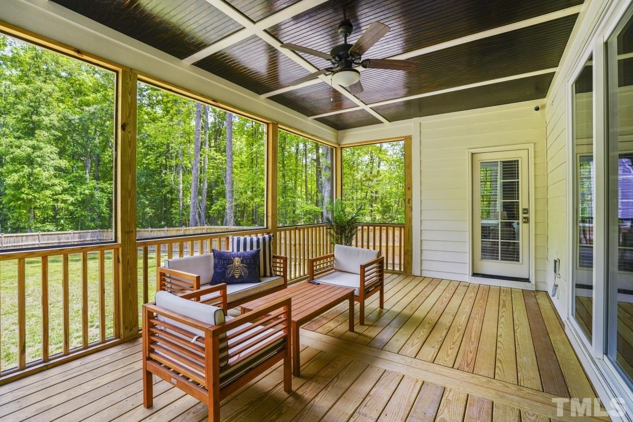 8600 Flannery Court Knightdale, NC 27545 - Photo 31 of 36 a balcony with wooden floor