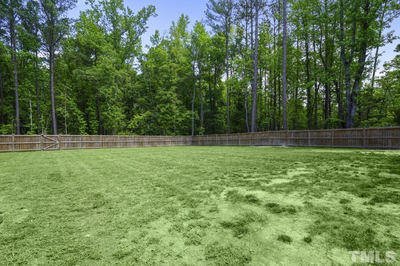 8600 Flannery Court Knightdale, NC 27545 - Photo 34 of 36 a view of outdoor space with deck and yard