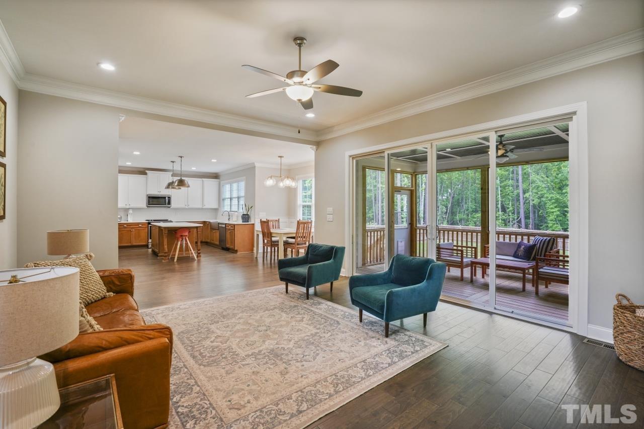 8600 Flannery Court Knightdale, NC 27545 - Photo 8 of 36 a living room with furniture and a large window