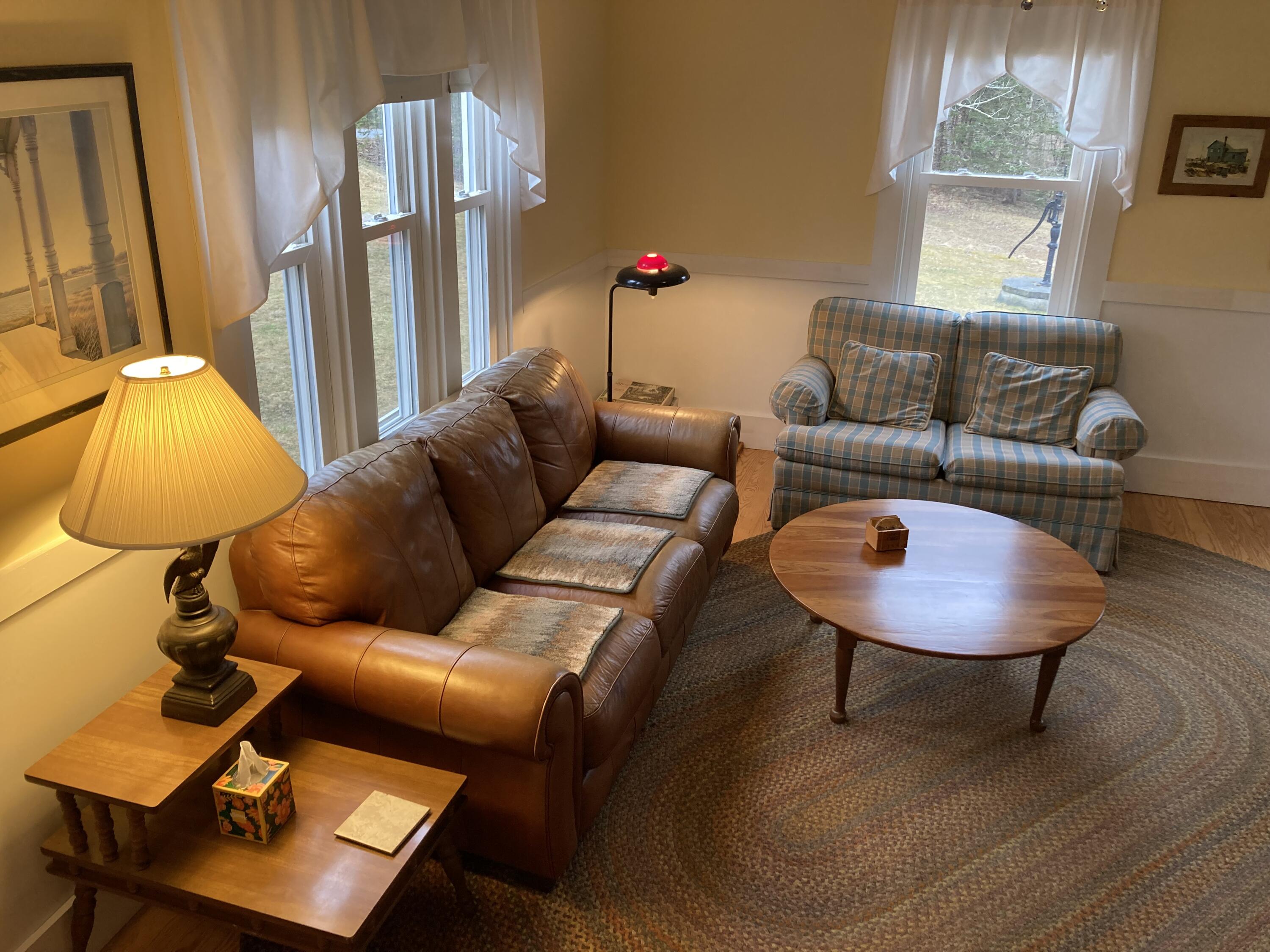 455 Point Road Hancock, ME 04640 - Photo 14 of 30 Living room from stairwell.