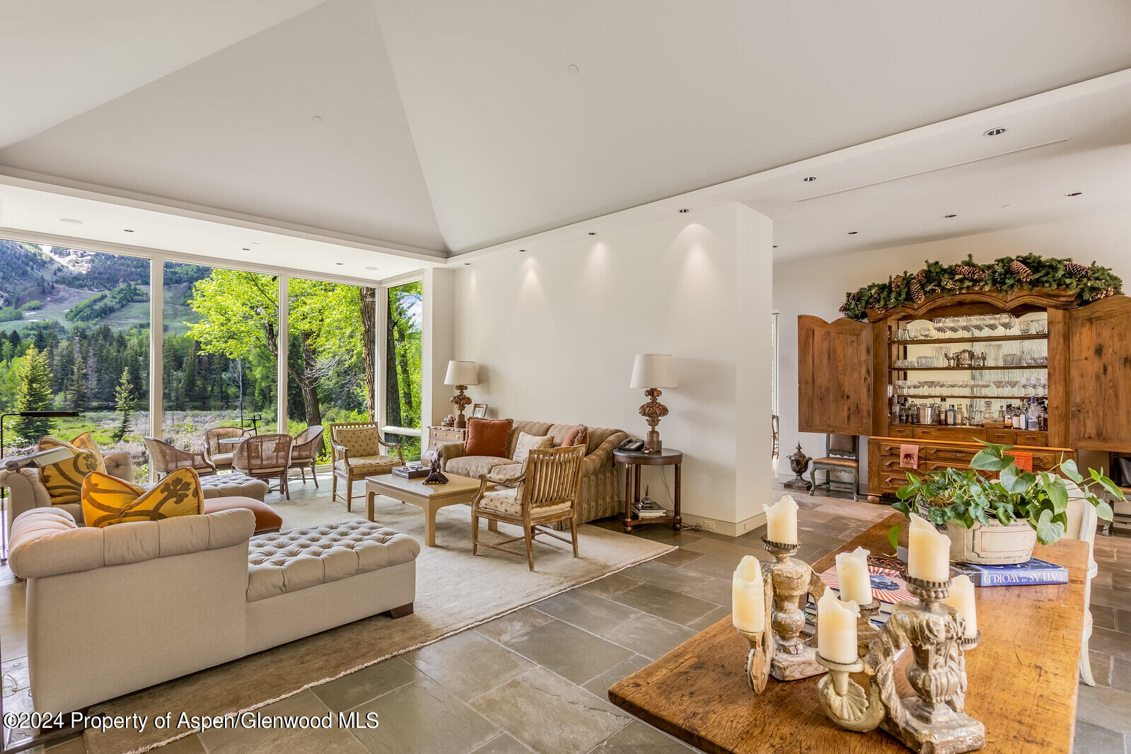 844 Roaring Fork Road Aspen, CO 81611 - Photo 9 of 39 a living room with furniture and a large window