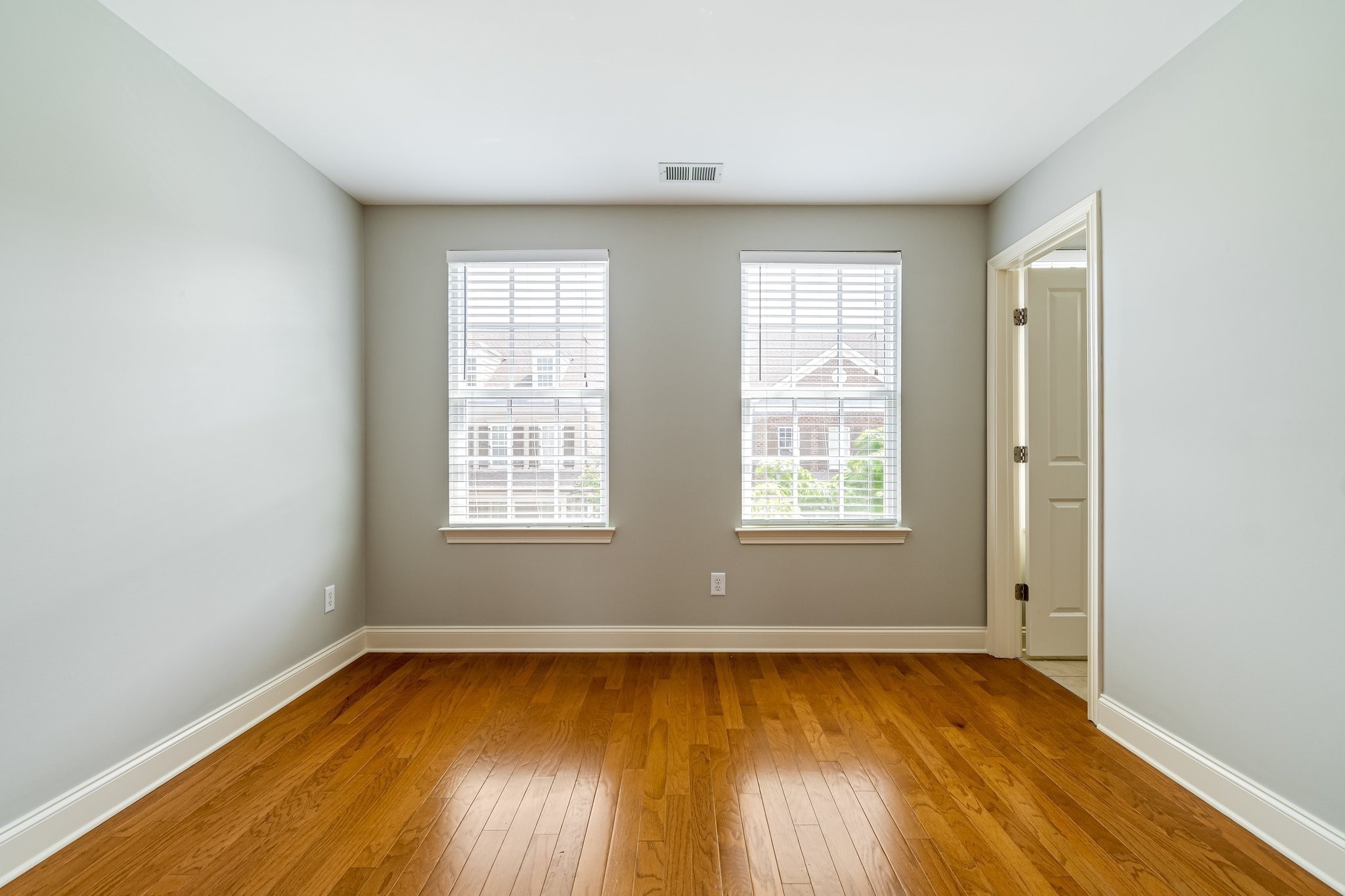 318 Byron Way Franklin, TN 37064 - Photo 29 of 53 an empty room with wooden floor and windows