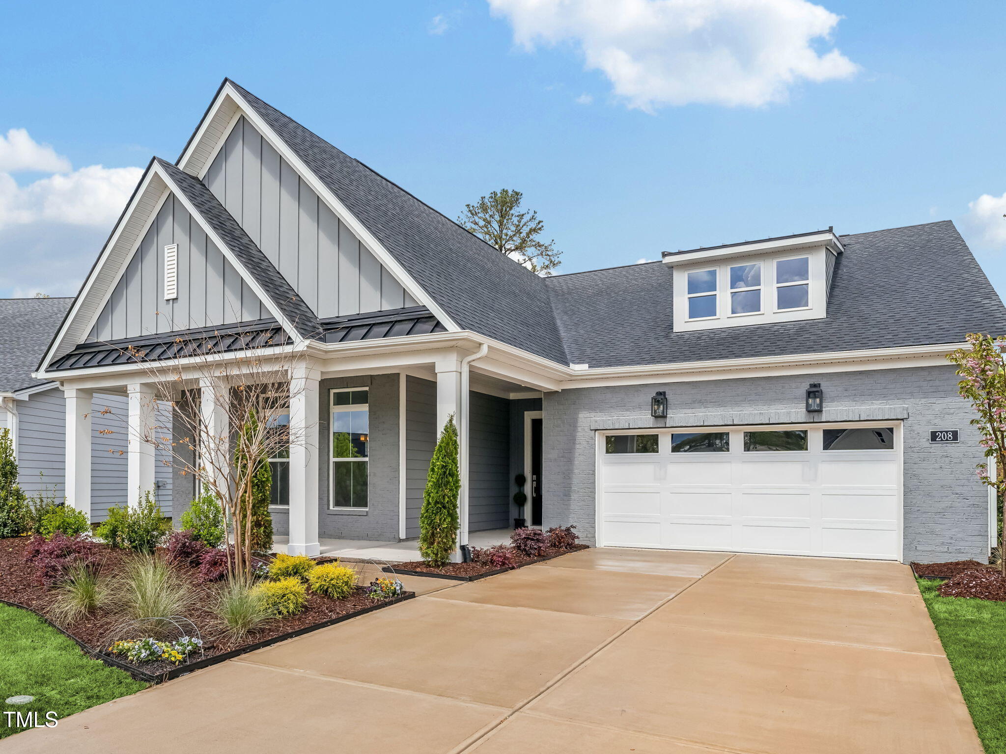 208 Regency Rdg Drive Holly Springs, NC 27540 - Photo 1 of 45 Stunning curb appeal with a large front porch