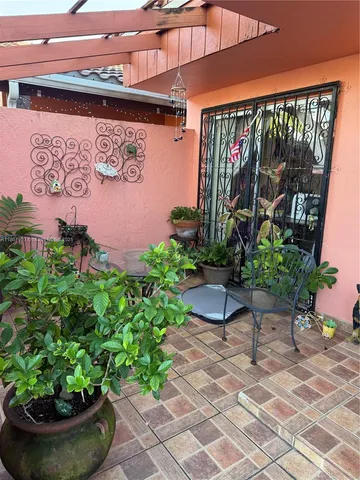 a view of a street with sitting space