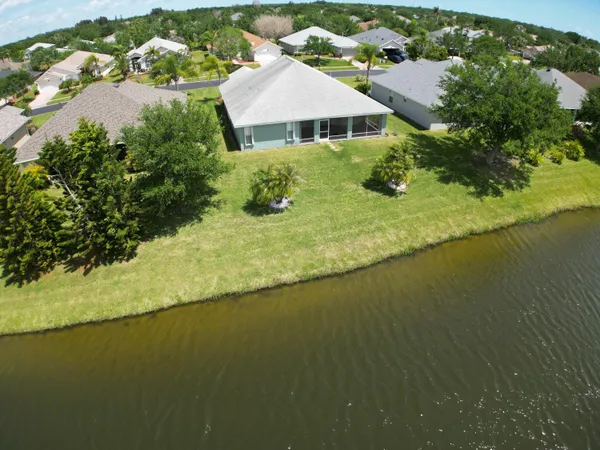 an aerial view of a house with a garden