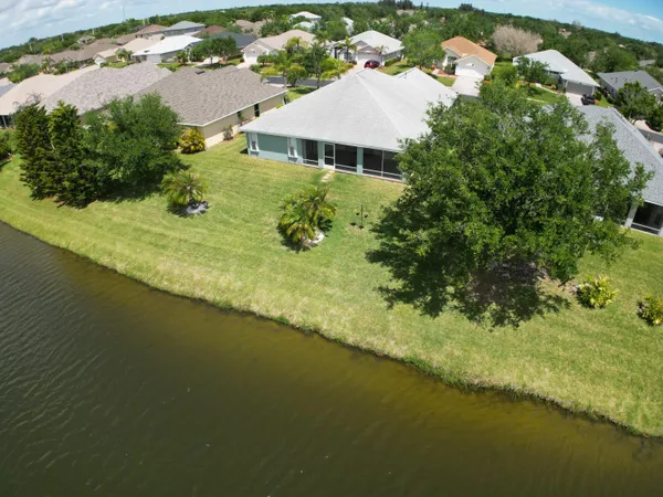an aerial view of a house with a garden