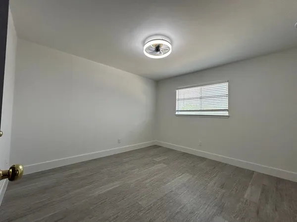 an empty room with a workbench