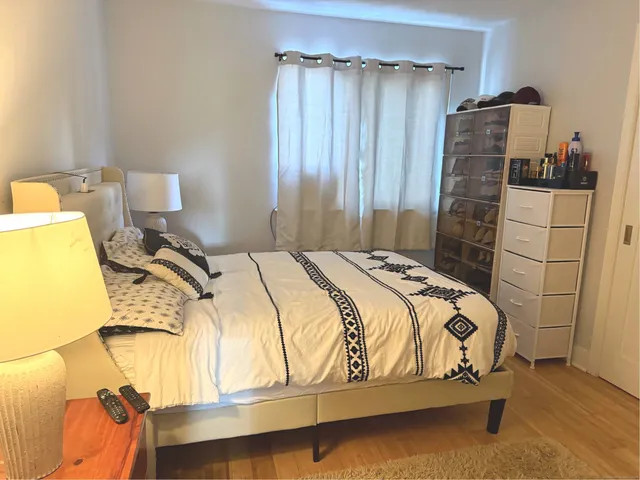 a bathroom with a sink toilet and mirror