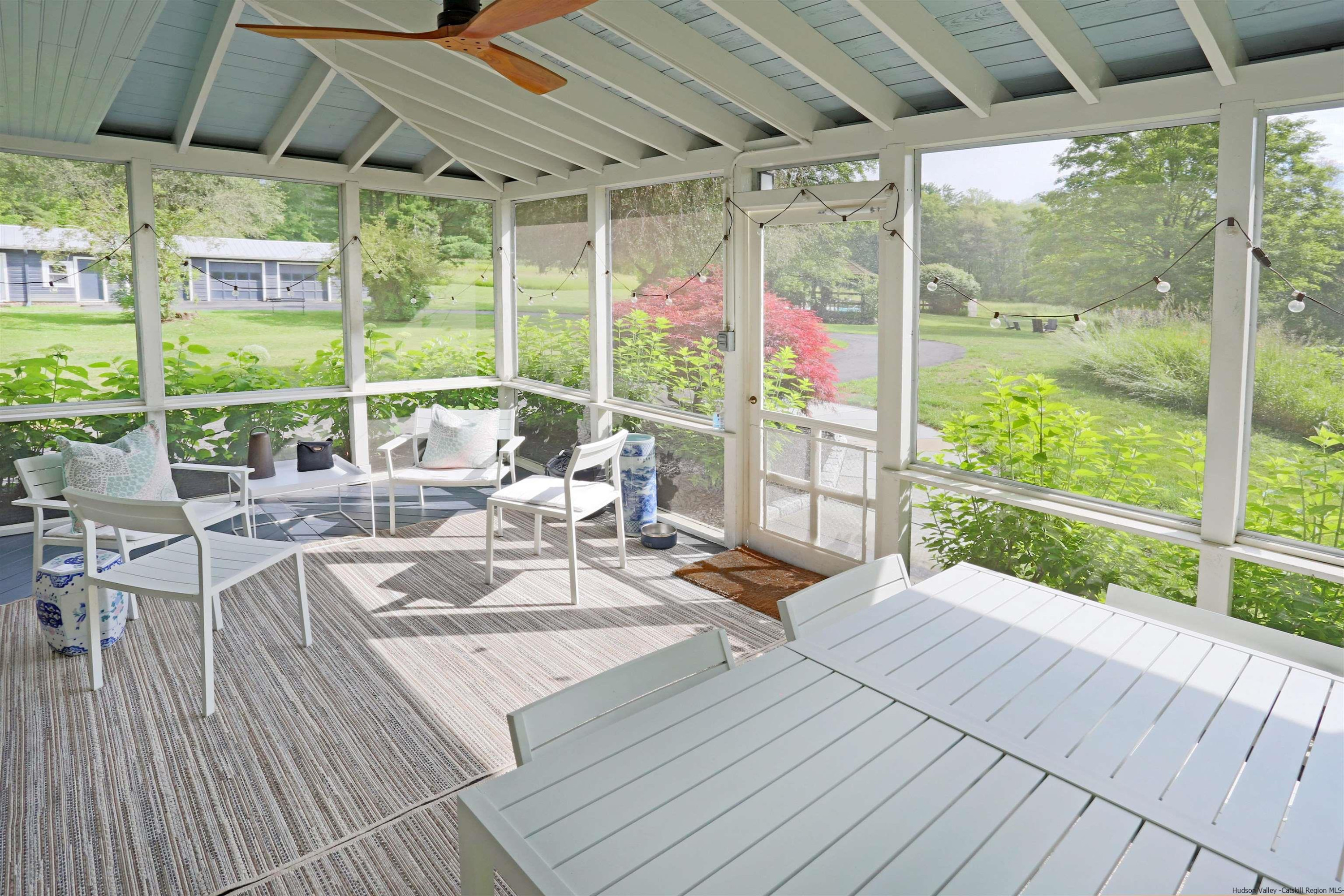 122 Peak Road Stone Ridge, NY 12484 - Photo 23 of 35 a living room with large windows