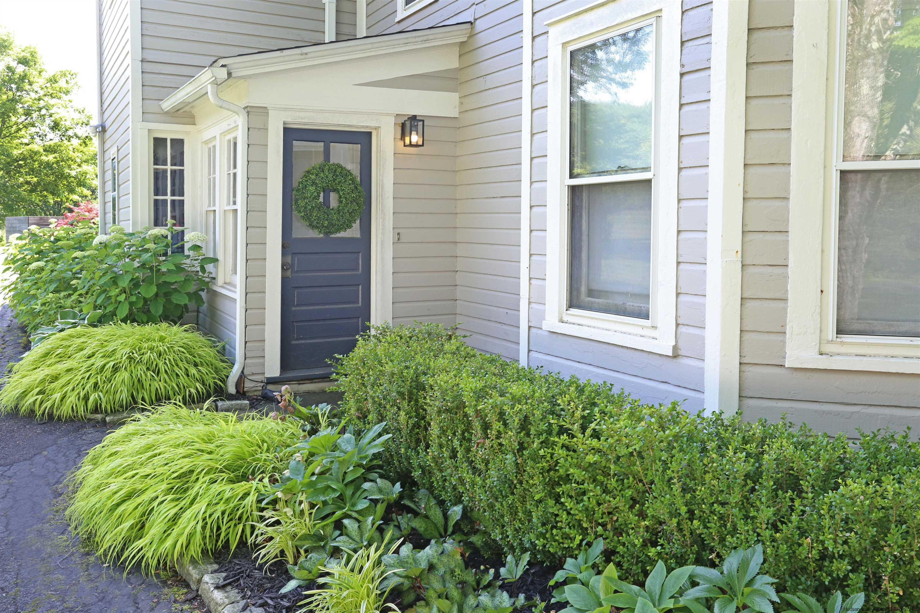 122 Peak Road Stone Ridge, NY 12484 - Photo 3 of 35 front view of a house with a yard