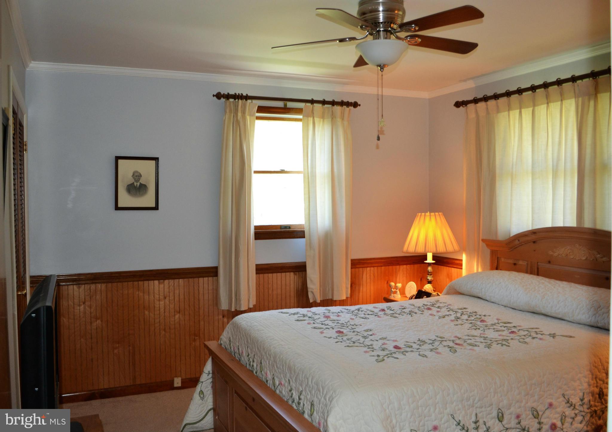 6421 Chell Road Columbia, MD 21044 - Photo 11 of 25 a bedroom with a bed and a window