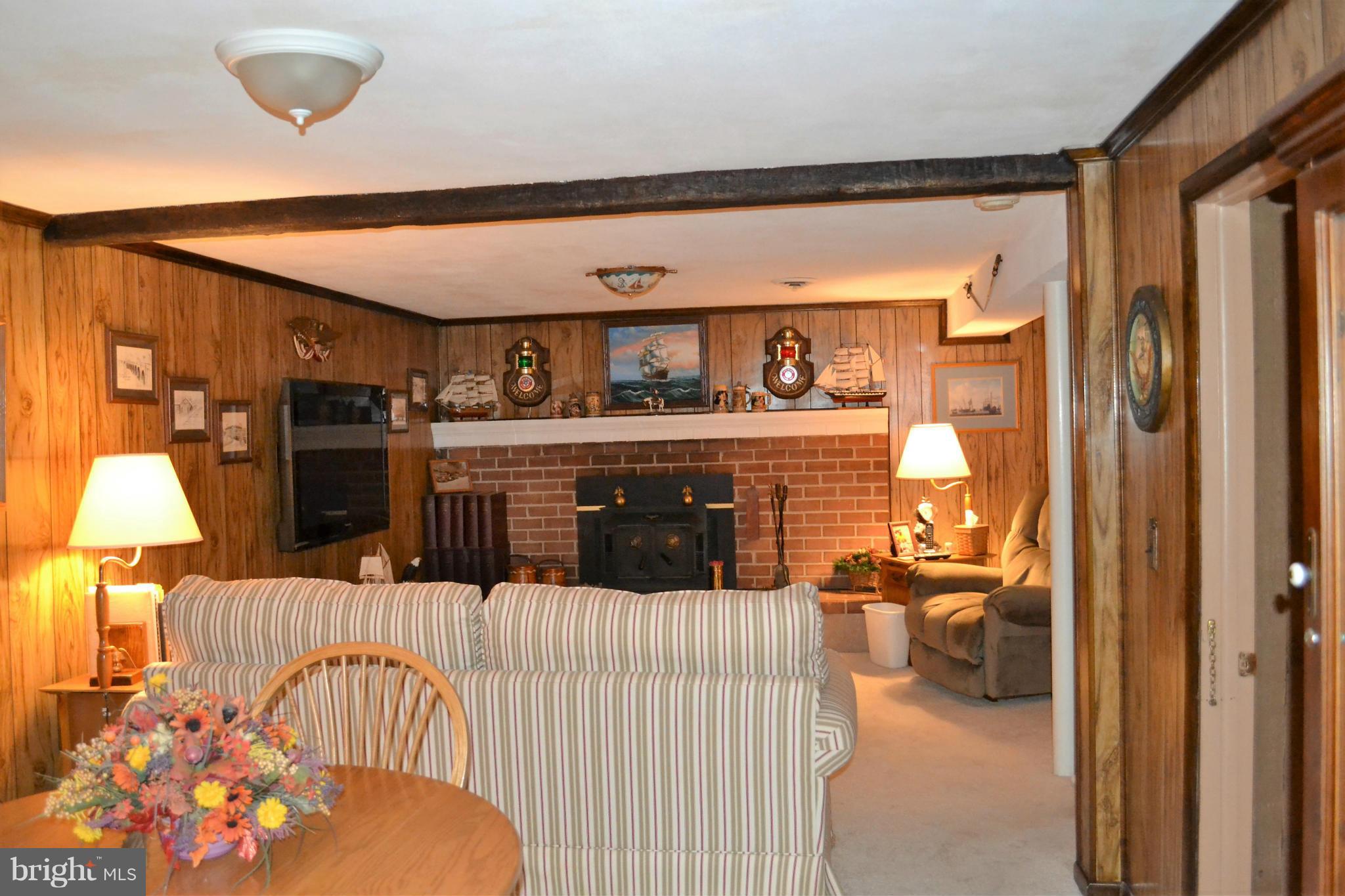6421 Chell Road Columbia, MD 21044 - Photo 16 of 25 a bed room with a bed and a television