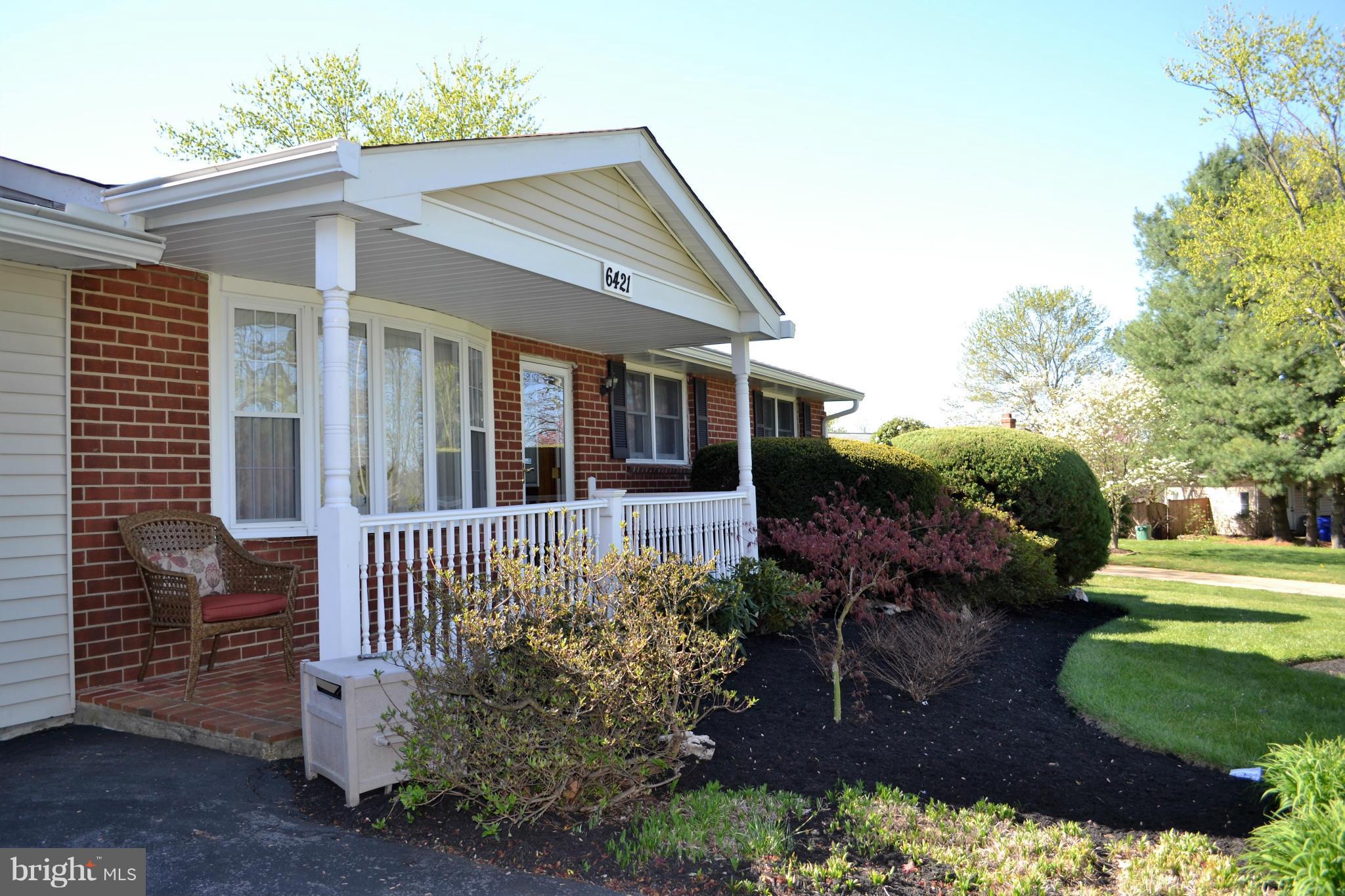 6421 Chell Road Columbia, MD 21044 - Photo 3 of 25 a front view of a house with garden