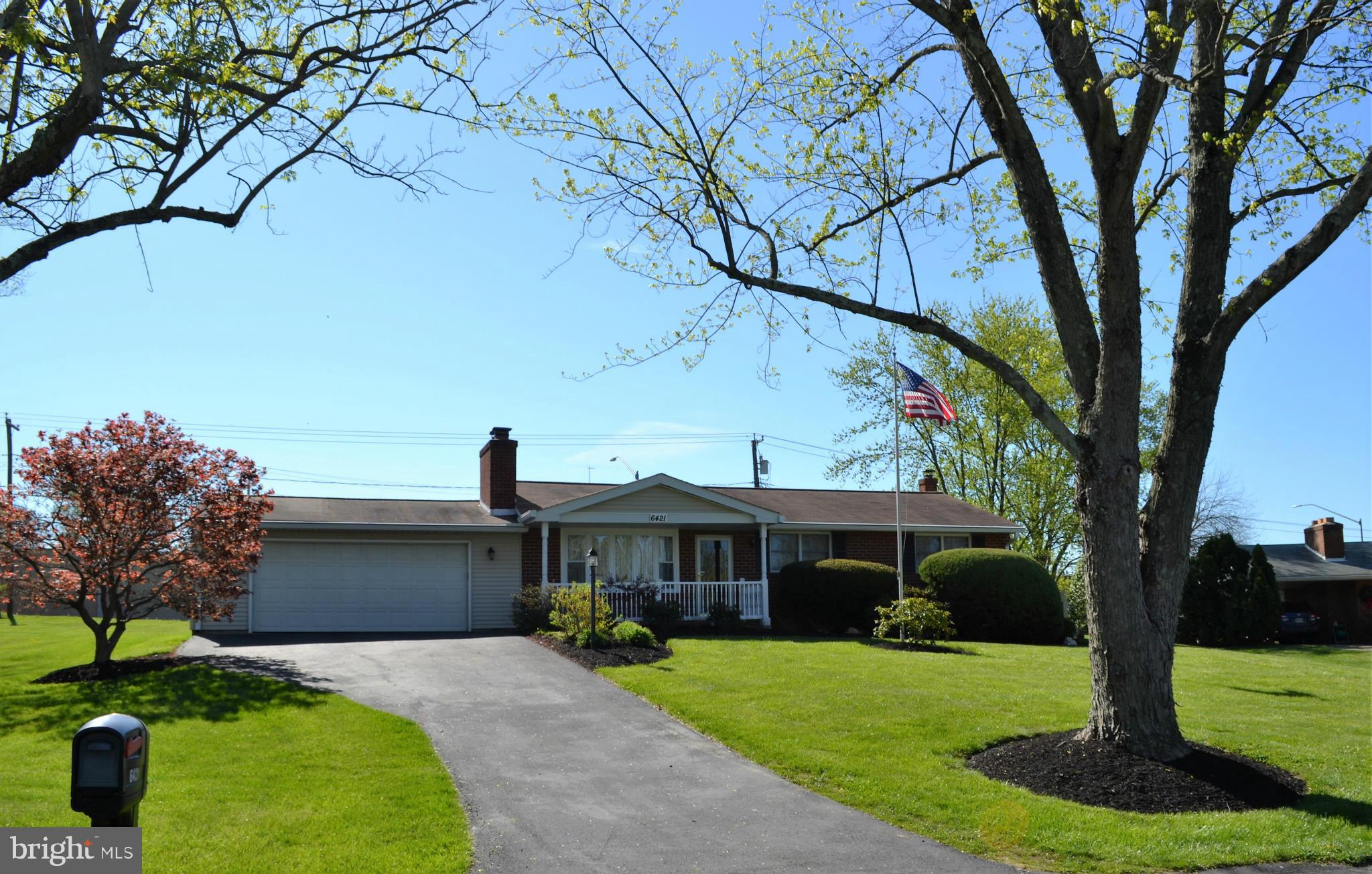 6421 Chell Road Columbia, MD 21044 - Photo 24 of 25 a front view of a house with a garden