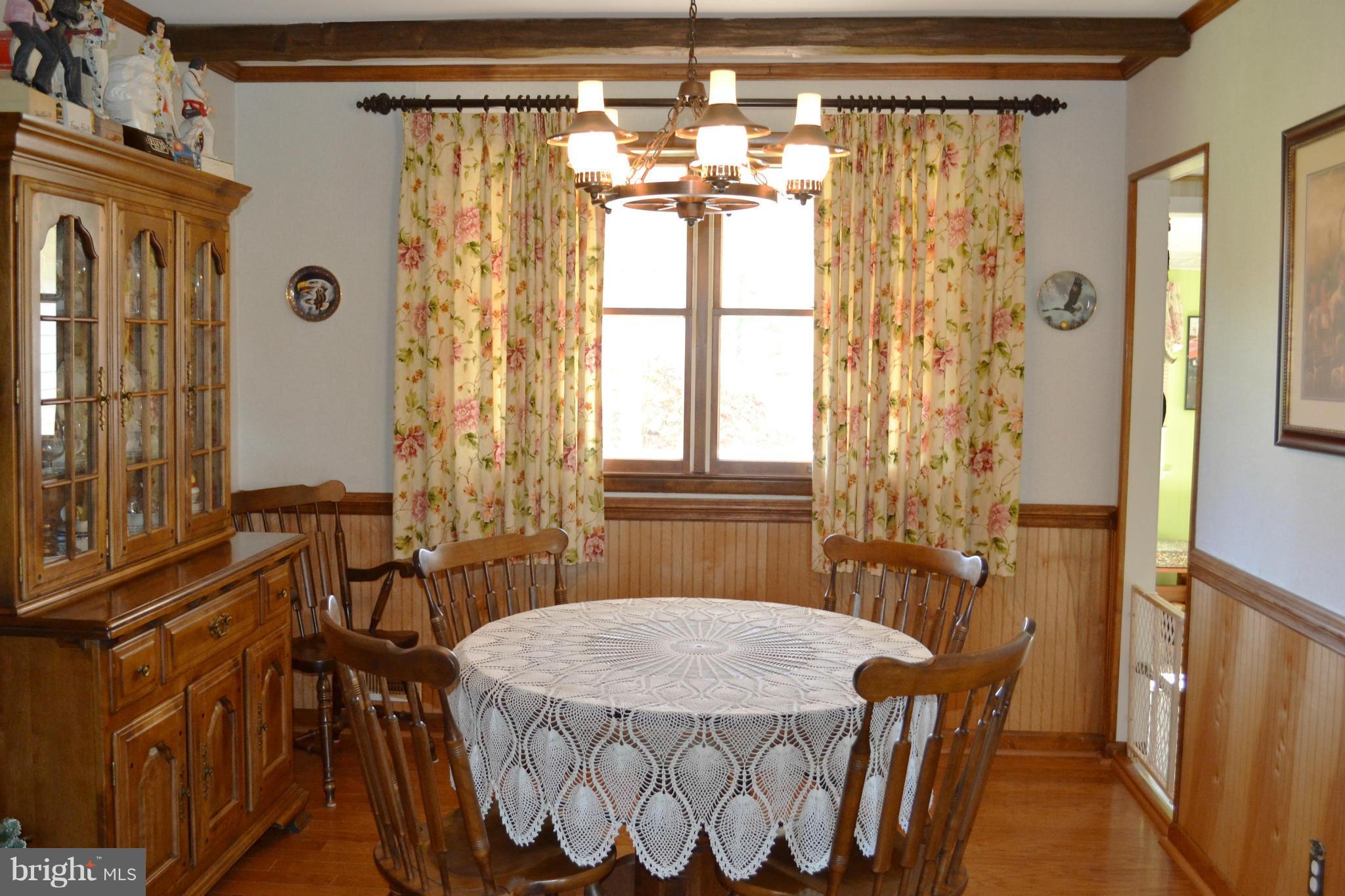 6421 Chell Road Columbia, MD 21044 - Photo 6 of 25 a dining room with window