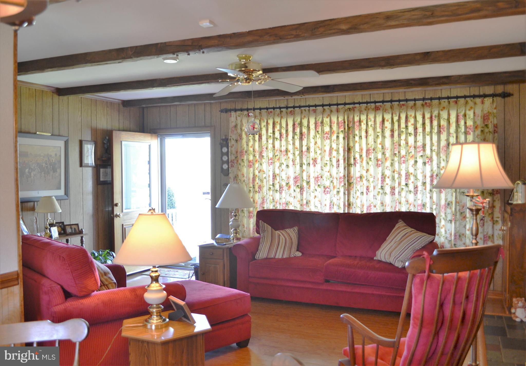 6421 Chell Road Columbia, MD 21044 - Photo 7 of 25 a living room with furniture and a large window