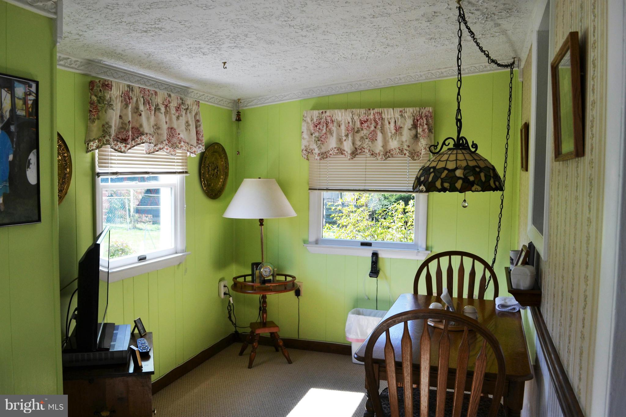 6421 Chell Road Columbia, MD 21044 - Photo 10 of 25 a dining room with furniture and window
