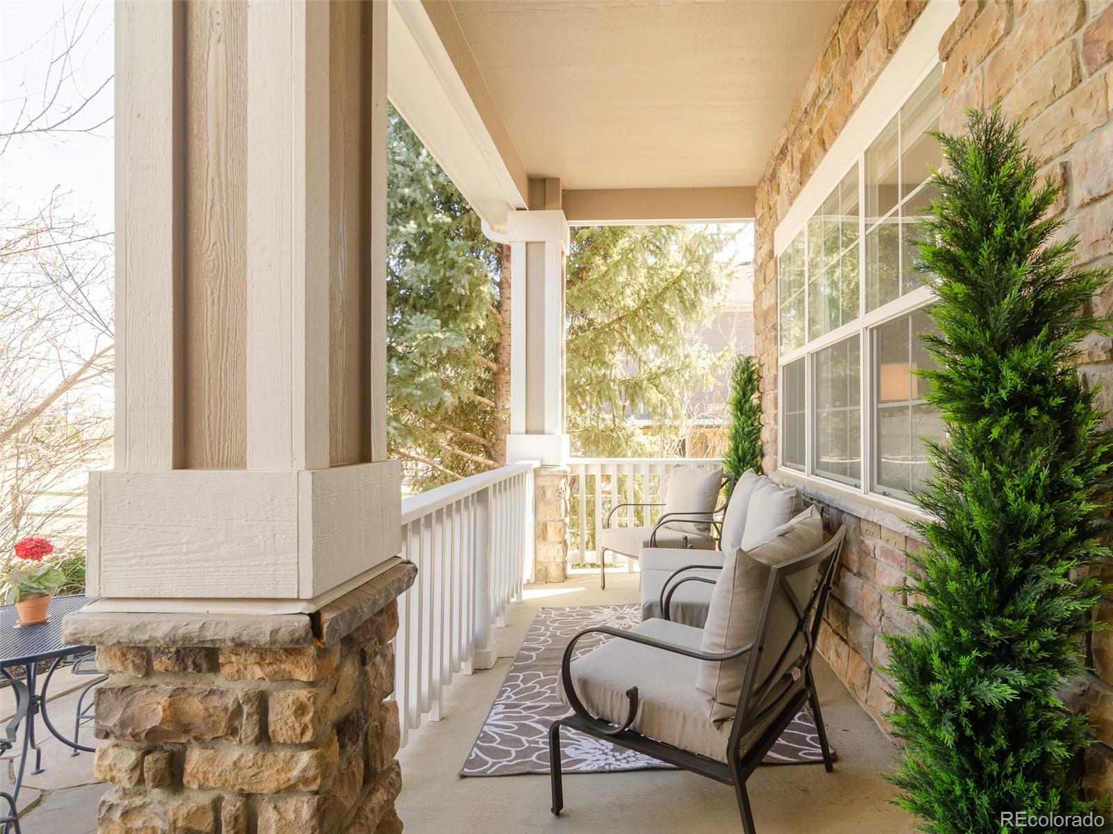 2080 Pearl Howlett Road Longmont, CO 80504 - Photo 12 of 46 a living room with furniture and a window