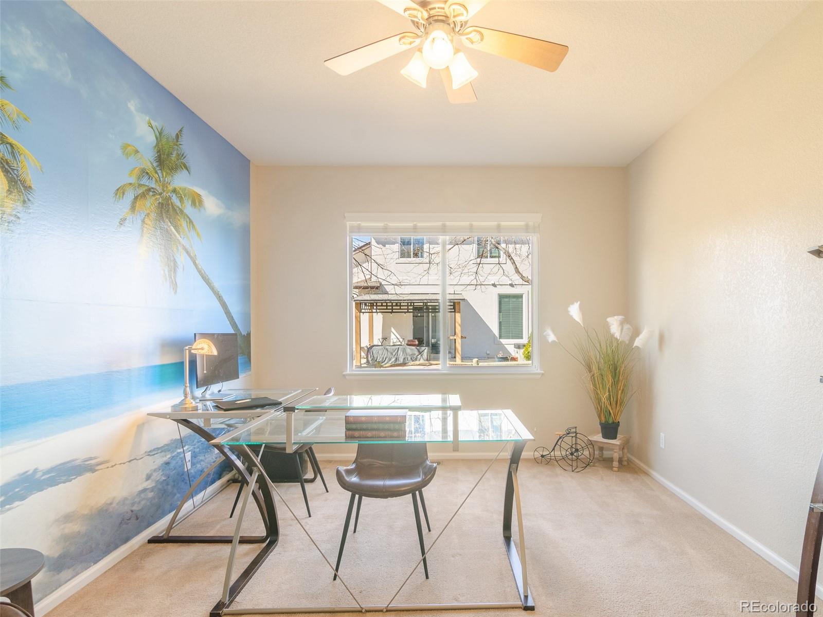 2080 Pearl Howlett Road Longmont, CO 80504 - Photo 28 of 46 a workspace with furniture and chandelier