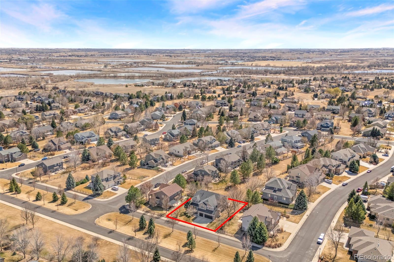 2080 Pearl Howlett Road Longmont, CO 80504 - Photo 10 of 46 an aerial view of beach and city