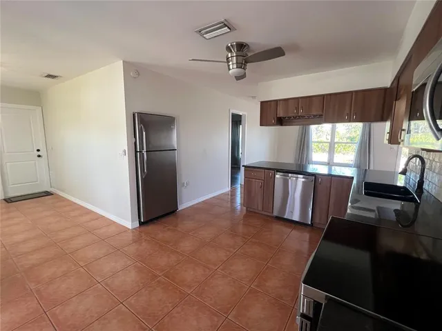 a view of a hallway with a large window