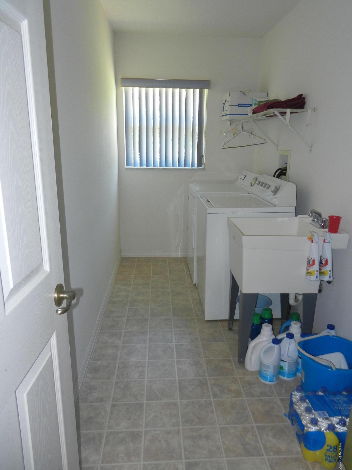 2205 Brownlee Road Seville, FL 32190 - Photo 19 of 27 a bathroom with a sink toilet and bathtub