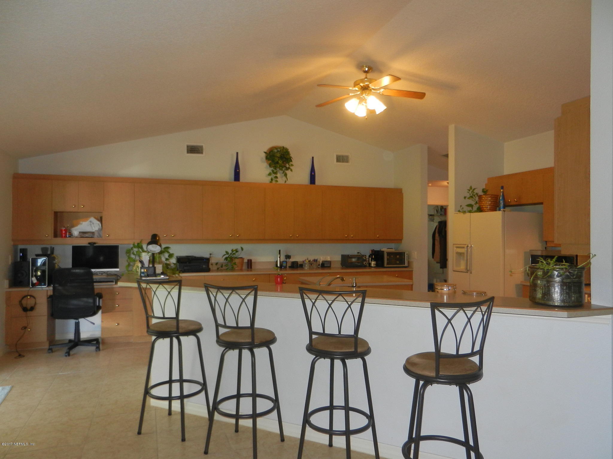 2205 Brownlee Road Seville, FL 32190 - Photo 7 of 27 a view of a dining room with furniture and chandelier