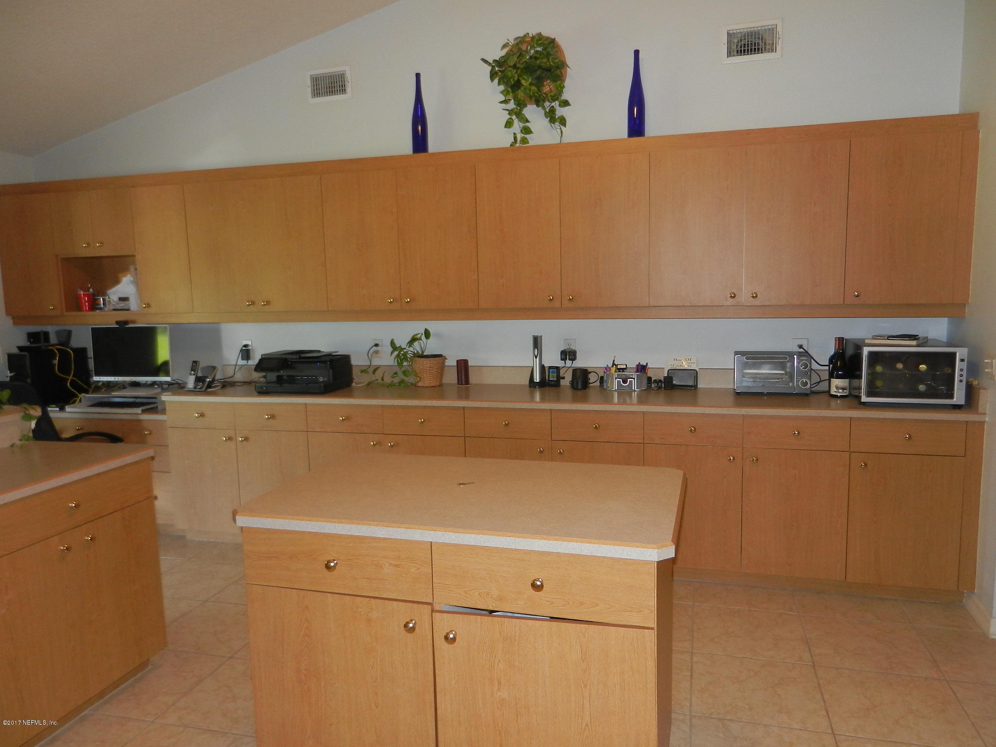 2205 Brownlee Road Seville, FL 32190 - Photo 8 of 27 a utility room with washer and dryer